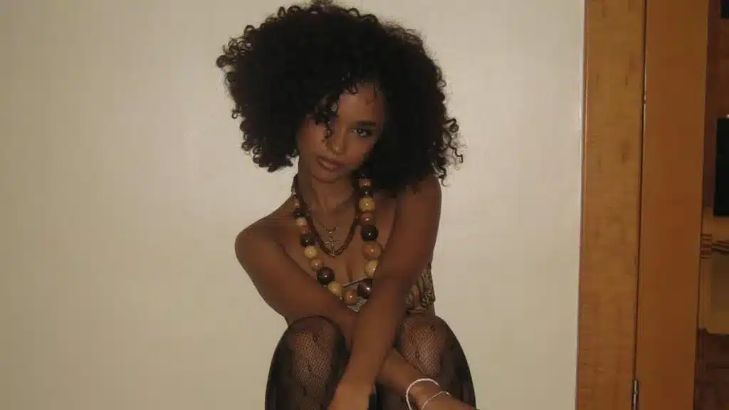 Tyla's barely-there bra top exposes her midriff